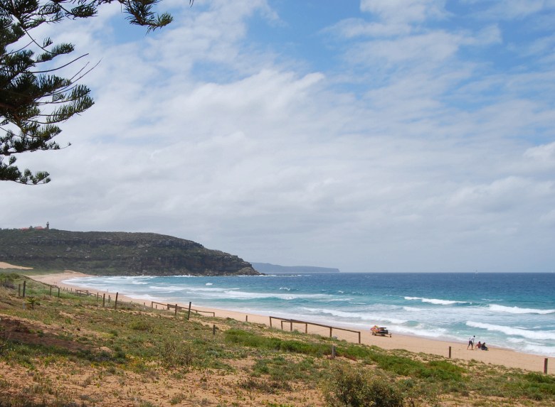 Palm Beach looking north - The lighthouse is at the top of Barrenjoey Head