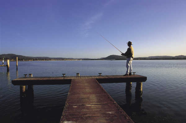 Man fishing off jetty, Brisbane Water
